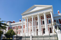 The Houses of Parliament building was designed and built by Sir Herbert Baker in 1885. Cape Town, Western Cape Province, South Africa - landscape exterior