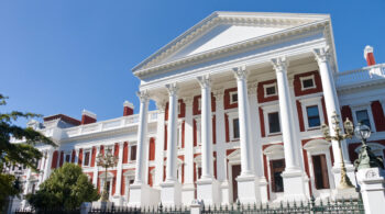 The Houses of Parliament building was designed and built by Sir Herbert Baker in 1885. Cape Town, Western Cape Province, South Africa - landscape exterior