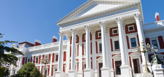 The Houses of Parliament building was designed and built by Sir Herbert Baker in 1885. Cape Town, Western Cape Province, South Africa - landscape exterior
